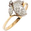 RING WITH DIAMONDS IN 10K YELLOW GOLD Weight: 2.0 g. Size: 7  1 Marquise cut diamond ~0.9...