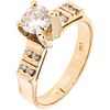 RING WITH DIAMONDS IN 10K YELLOW GOLD  Weight: 4.1 g. Size: 5 ¼   1 Brilliant cut diamond ~0.55 ct Clarity:...