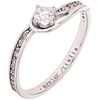 RING WITH DIAMONDS IN 14K WHITE GOLD Weight: 1.6 g. Size: 7 1 Brilliant cut diamond ~ 0.16 ct 20 Diamond ...