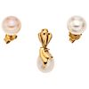 PENDANT AND PAIR OF STUDS WITH 14K YELLOW GOLD CULTIVATED PEARLS Earring with rigid chain pass. Size: 0.7 x ...