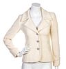 * A Chanel Cream Boucle Jacket, Size 34.