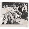 [CIVIL RIGHTS]. [COUNTS, Will, photographer]. Press photograph of African American minister being pushed by Little Rock, AR crowd after African Americ