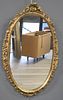 Carved And Giltwood Louis XV Style Oval Mirror