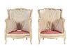 A Pair of Louis XV Carved and White-Painted Low Bergeres
