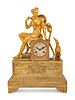 An Empire Style Gilt Bronze Figural Mantel Clock