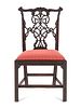 A George III Carved Mahogany Ribbon-Back Side Chair after a Design by Thomas Chippendale