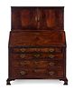 A George III Carved Mahogany Slant-Front Secretary Desk in the Chippendale Taste