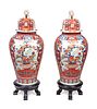A Pair of Large Imari Palette Porcelain Jars with Wood Stands