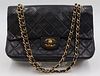 COUTURE. Vintage Chanel Medium Black Quilted Bag.