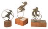 Three Frank Eliscu (1912 - 1996) Bronzes, children playing hopscotch, hula hoop, and riding a bike, all signed on base, tallest height 5 1/2 inches.