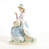 Goose Trying to Eat 1005034 - Lladro Porcelain Figure