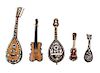 A Group of Five Tortoise Shell and Composite Shell Inlaid Miniature Musical Instruments Length of longest 11 3/4 inches.