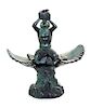 * A Neoclassical Patinated Bronze Fountainhead Height 11 inches.