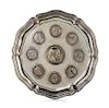 A German Silver Tray, 19th/20th Century, of shaped circular form, inset with eight 19th and 20th five-mark coins centered with a