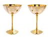 * A Pair of Silver and Silver-Gilt Commemorative Goblets, Stuart Devlin, 1973, each raised on a tripartite foot embossed with sc