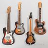 Electric Bass Guitar and Three Electric Guitars
