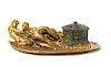 * A Tiffany Studios Jeweled Gilt Bronze Figural Inkwell Length 10 1/8 inches.