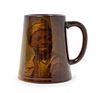 A Rookwood Pottery Portrait Mug Height 4 3/4 inches.