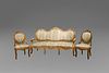 Eight armchairs and a three-seater sofa in carved and gilded wood, with plant motifs and scrolls, 19th century