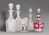 Four bottles and a crystal goblet, 20th century