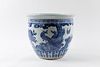 Large blue and white porcelain cachepot decorated with landscape and birds, China, 20th century