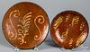 Two slip decorated redware plates