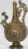A profusely decorated brass Indian ewer , with floral motifs ,