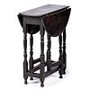 A William and Mary Black Painted Oak Gate-Leg Table, English, Circa 1700