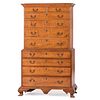 A Chippendale Carved Tiger Maple Chest-on-Chest, New Hampshire