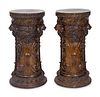 A Pair of Neoclassical Style Patinated Metal Pedestals
Height 39 1/4 x diameter 18 1/2 inches.