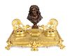 A Louis XV Style Gilt Bronze Encrier Mounted with Bronze Portrait Bust of Moliere
Height 8 1/2 x width 12 3/4 inches.