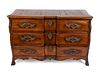 A Louis XV Provincial Walnut Commode
Height 33 3/4 x length 53 1/2 x depth 25 3/4 inches.