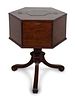 A George III Style Mahogany Hexagonal Cellarette
Height 31 x width 25 x depth 21 1/2 inches.
