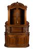 A Victorian Style Carved Walnut Buffet Ã  Deux Corps
Height 125 x width 80 x depth 24 1/4 inches.