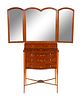 An Edwardian Painted Satinwood Dressing Table
Height 59 x width closed 23 1/2 x depth 14 inches; width open 47 inches.