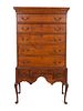 A Queen Anne Cherrywood Flat-Top Highboy
Height 70 1/4 x width 39 1/4 x depth 20 1/2 inches.
