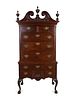 A Chippendale Style Mahogany Highboy
Height 87 x width 43 1/4 x depth 24 1/4 inches.