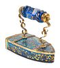 A Continental Brass-Mounted and Gilt-Decorated Blue Glass Iron-Form Box
Height 5 1/2 x length 6 1/2 x width 3 1/8 inches.
