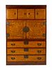 A Japanese Kiri Wood Tansu
Height 69 1/4 x width 46 x depth 19 1/4 inches.