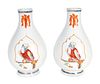 A Pair of Famille Rose Porcelain Parrot on a Perch Vases
Height 12 inches.
