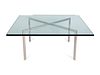 A Mies van der Rohe Chome and Glass Barcelona Table
Height 17 x width 40 x depth 40 inches.
