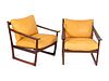 Peter Hvidt and Orla Molgaard Nielsen 
(Danish, 1916-1986) and  (Danish, 1907-1993)
A Pair of Rosewood Lounge Chairs