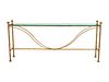 A Neoclassical Style Gilt-Metal and Glass Console
Height 32 x length 71 1/2 x depth 11 inches.