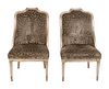 A Set of Four Neoclassical Style Silvered Rattan Barrel-Back Chairs
Height 42 1/2 x width 24 1/2 x depth 22 inches.