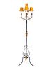 A Mizner Style Wrought-Iron Four-Light Torchere
Height 62 x diameter 17 1/2 inches.