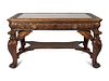 An American Renaissance Carved Mahogany Library Table
Height 29 x length 55 x width 36 inches.