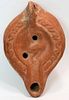 Ancient Roman Red Clay Oil Lamp with Bird c.200 AD. Size 5 3/8 inches length. Fine Large North African Red Clay Oil Lamp with Bird looking back in the