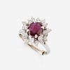 A ruby, diamond, and fourteen karat white gold ring,