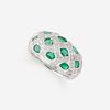 A diamond, emerald, and eighteen karat white gold ring,