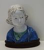Unsigned Glazed Terracotta Bust of a Child.